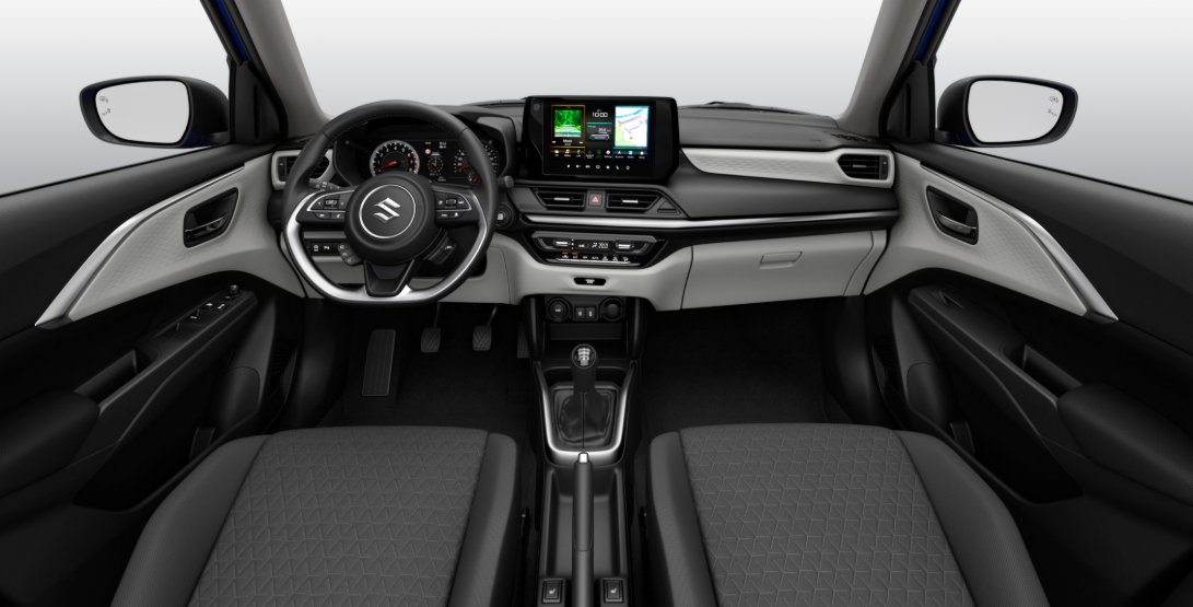 The interior and dashboard of a Suzuki Swift.